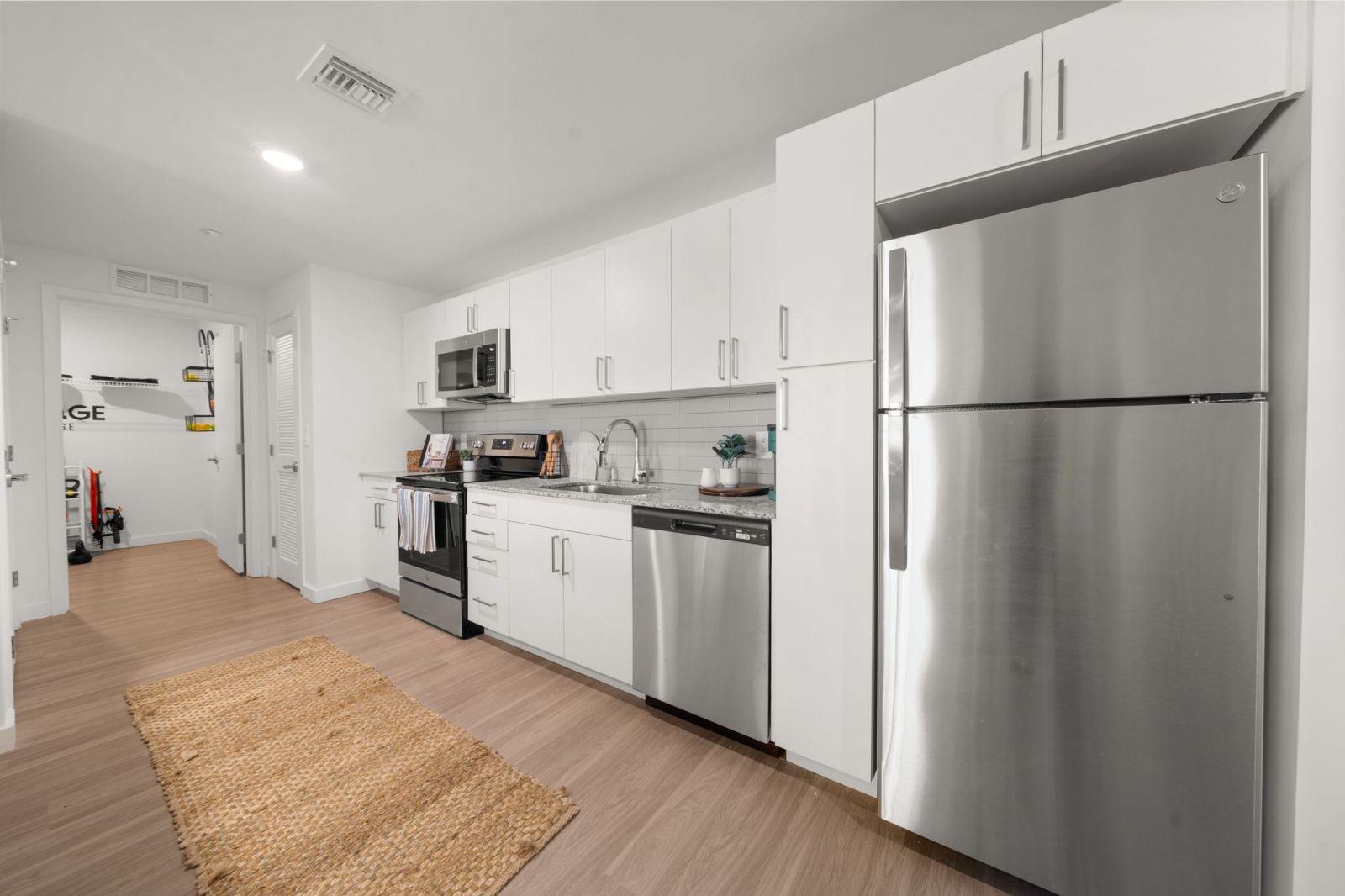 Modern kitchen with stainless steel fridge